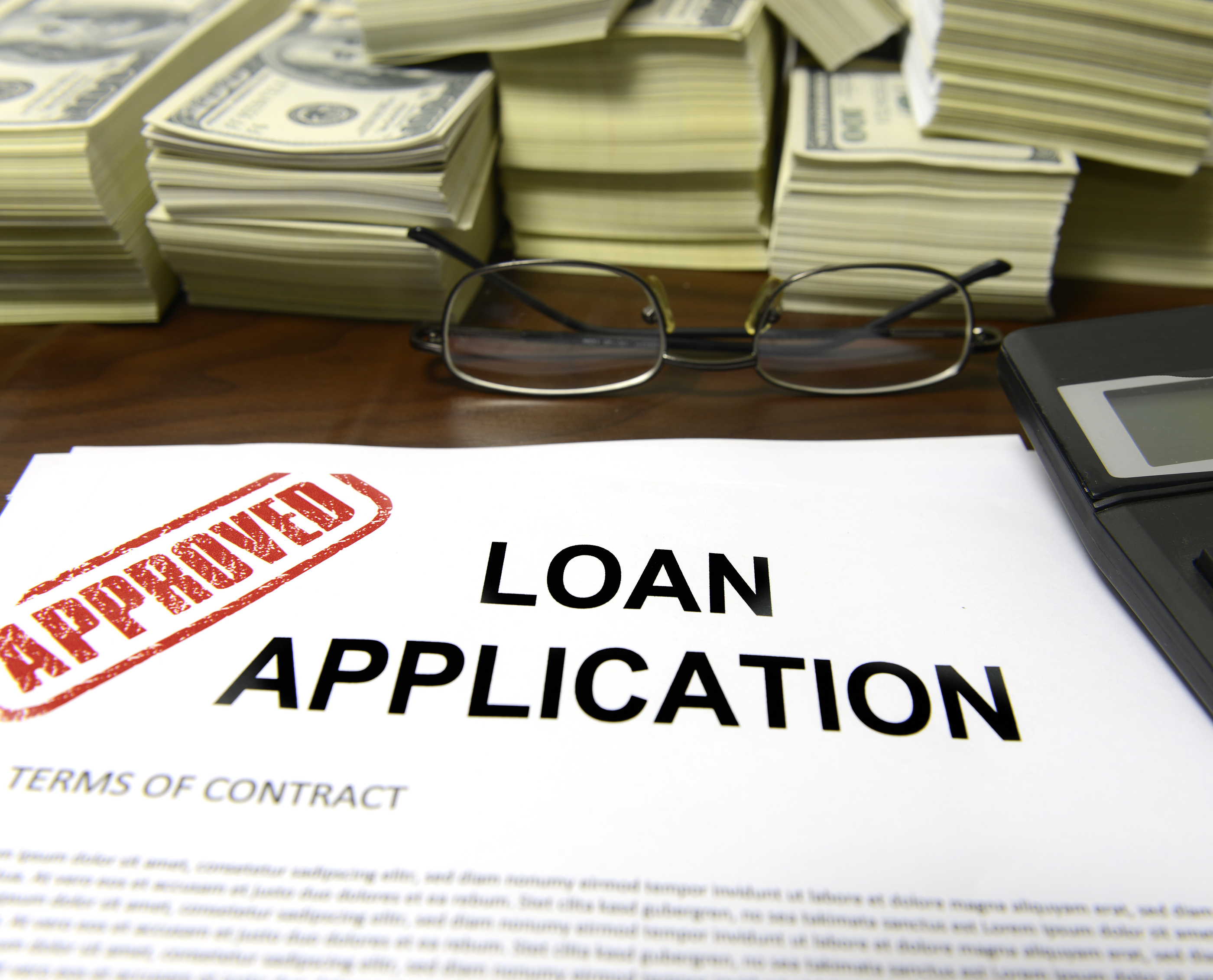 bigstock-Approved-loan-application-and-40435825.jpg